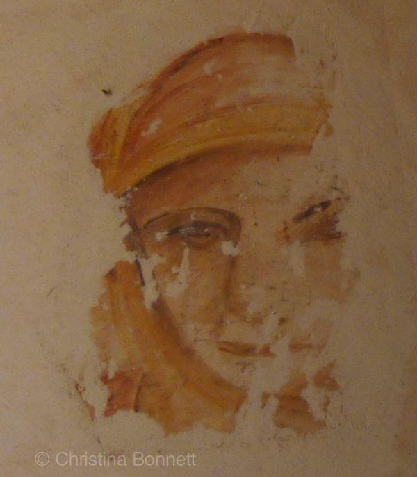 Fresco face in plaster